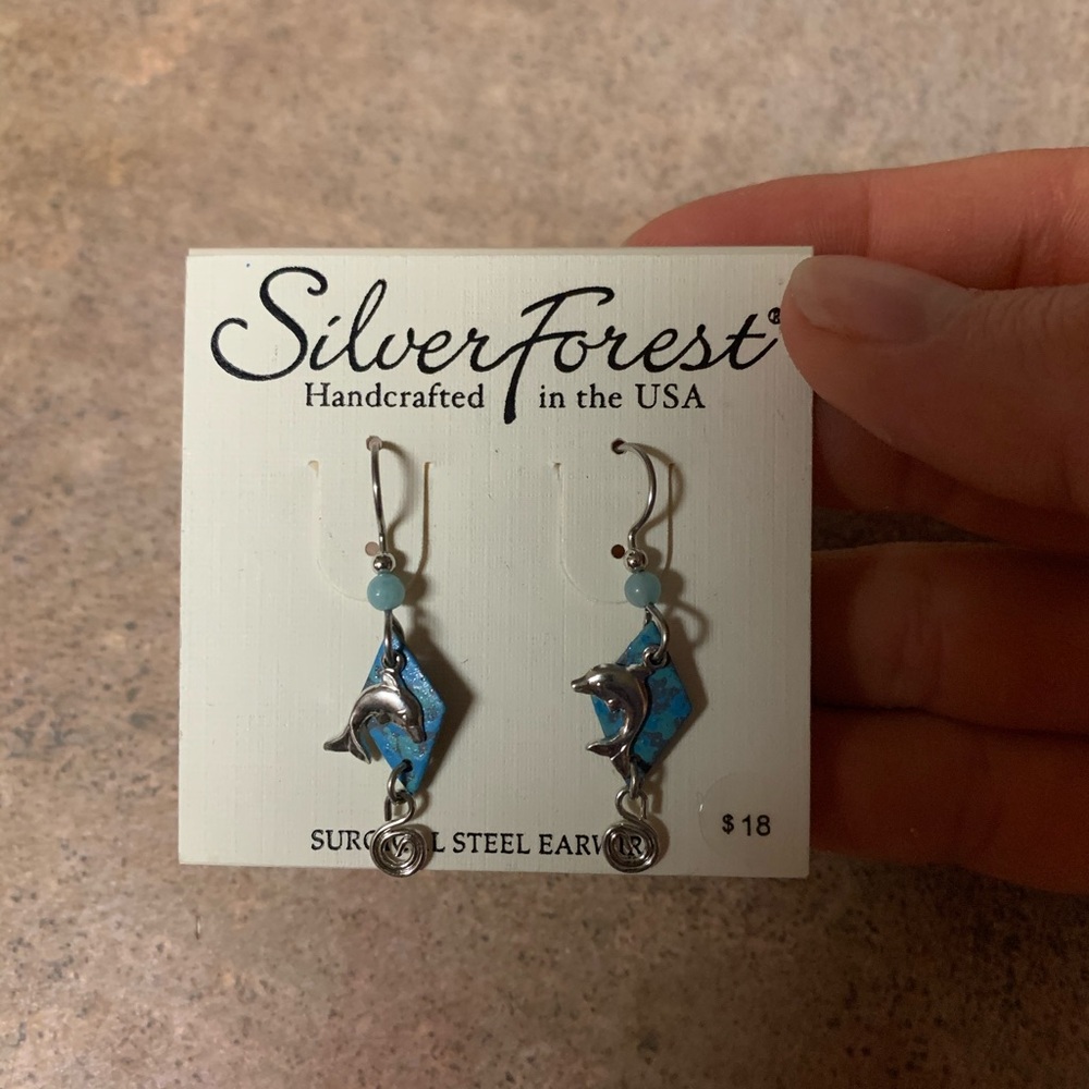 Serling silver dolphin earrings
